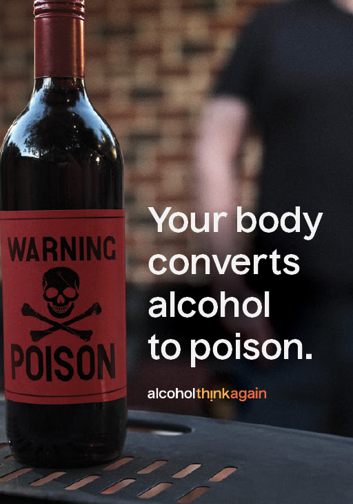 Wine bottle with text your body converts alcohol to poison