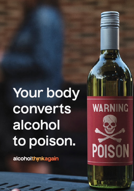 Wine bottle with text your body converts alcohol to poison
